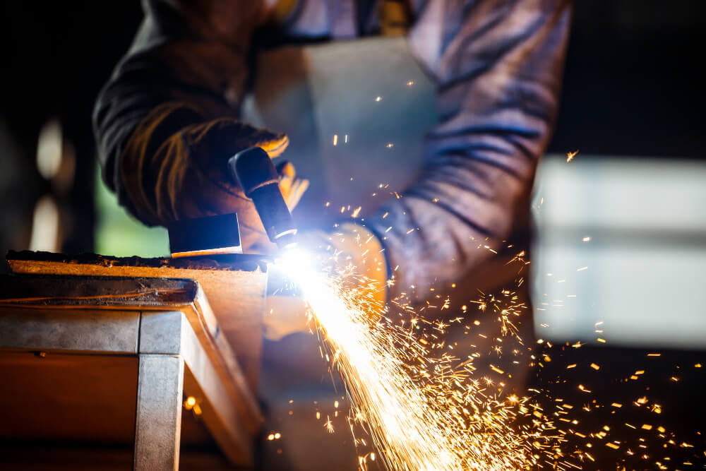 Welder Working Welder Working and a Lot of Sparks Appear