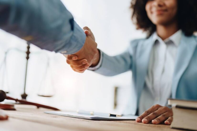 How Does the New York State Tax Code Treat Recoveries? Photo of people shaking hands